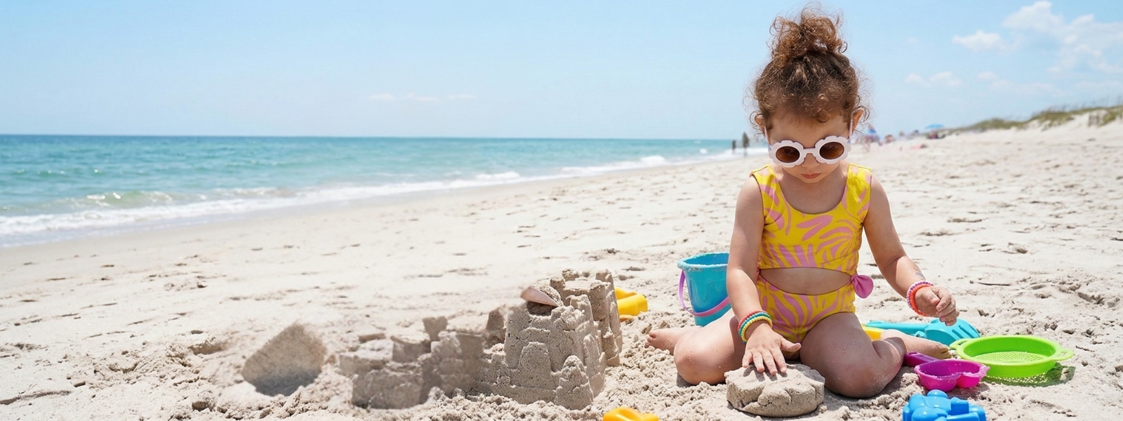 girl wearing laino swimwear on the beach