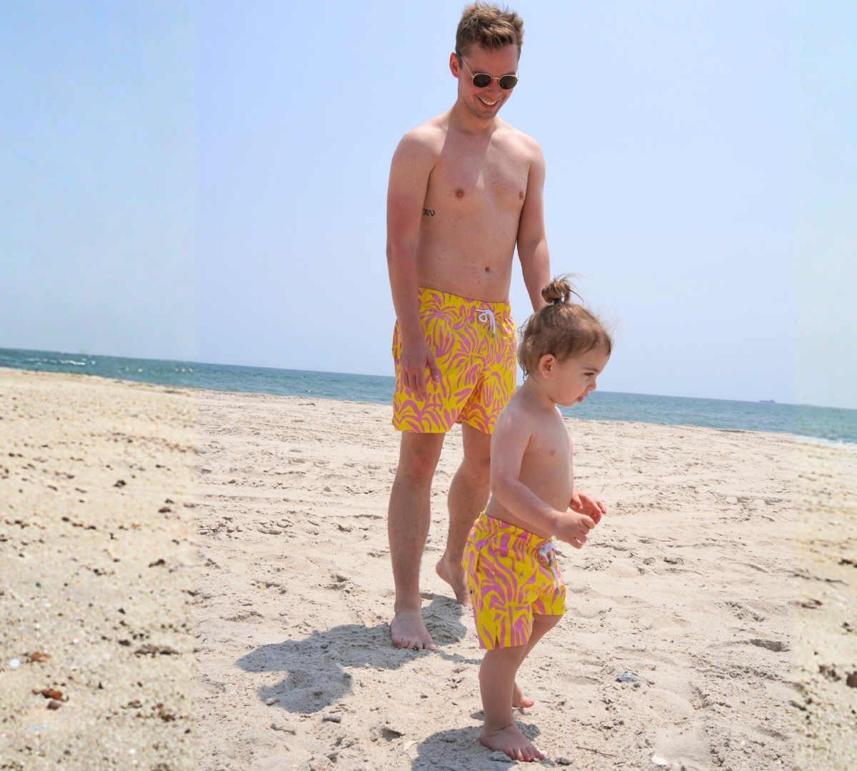 dad and son wearing matching swimsuits from laino swimwear